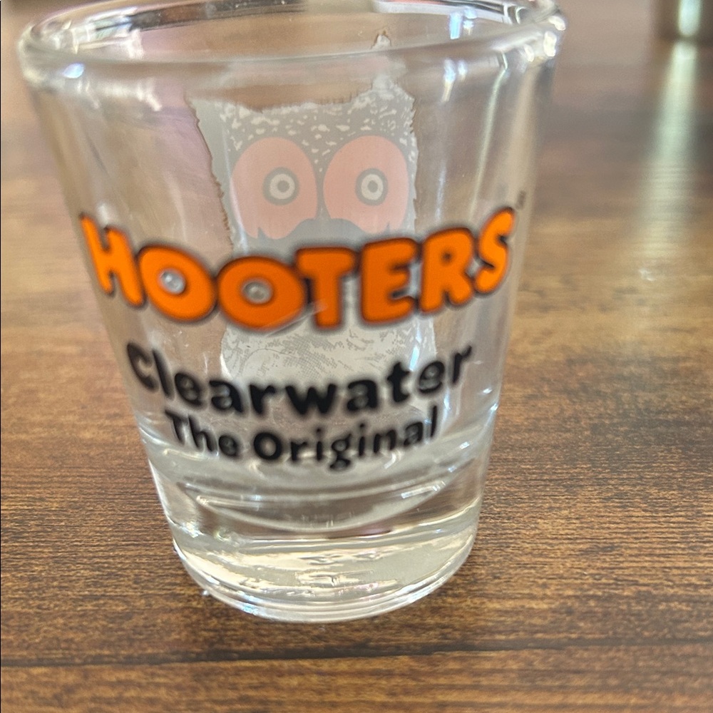 Hooters Clearwater Original Shot Glass with Orange and Black Text
